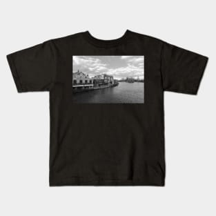 Restaurants on river Thames and clouds in Windsor UK Kids T-Shirt